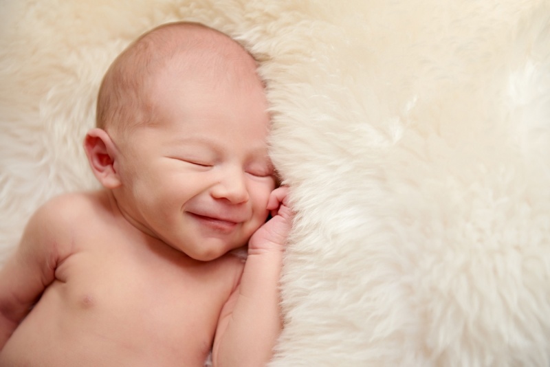Babyfotografie lächelndes Baby